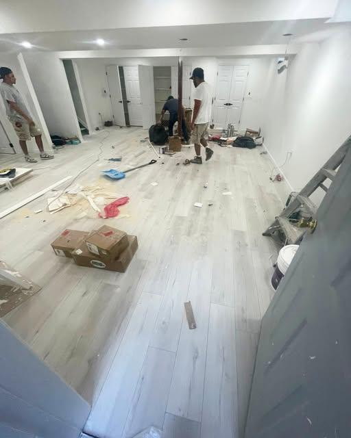 Everkleen crew member cleaning a newly built interior